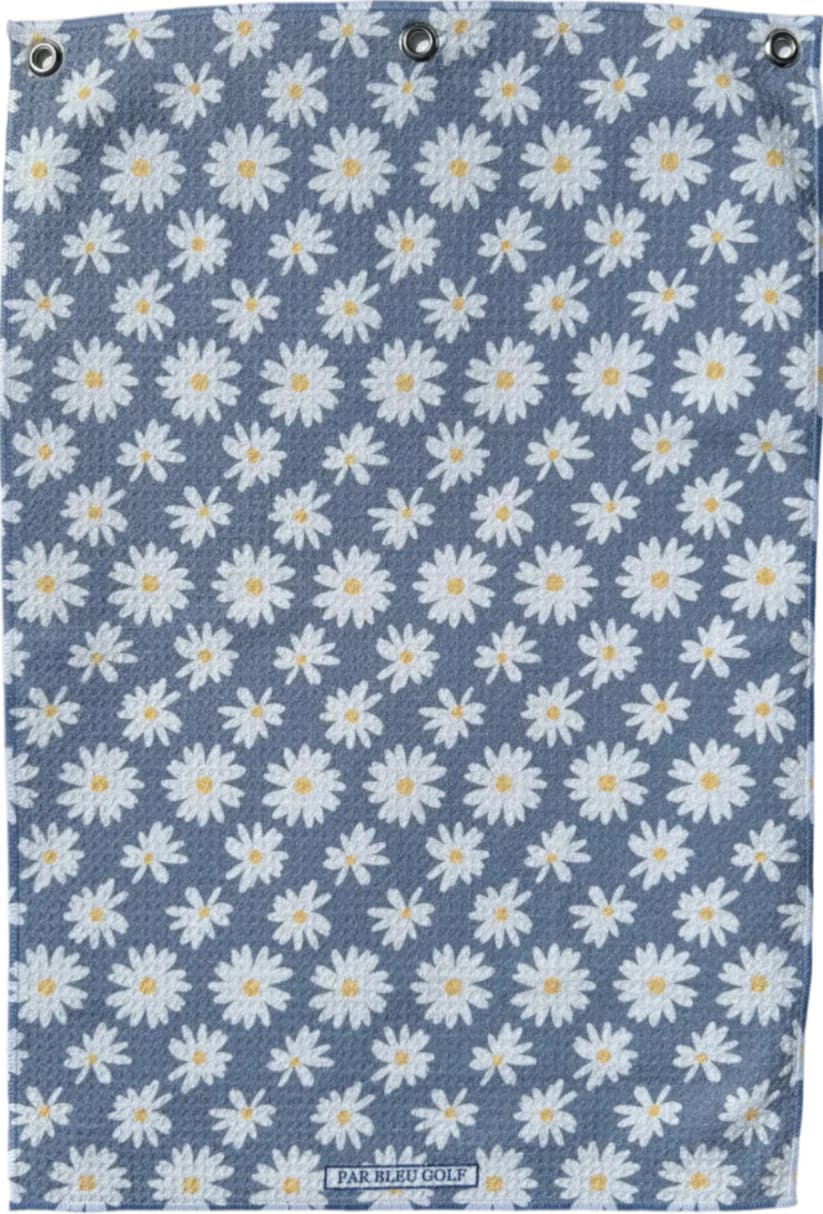 Full view of The Grey Daisy golf towel with soft grey background and repeating daisy print