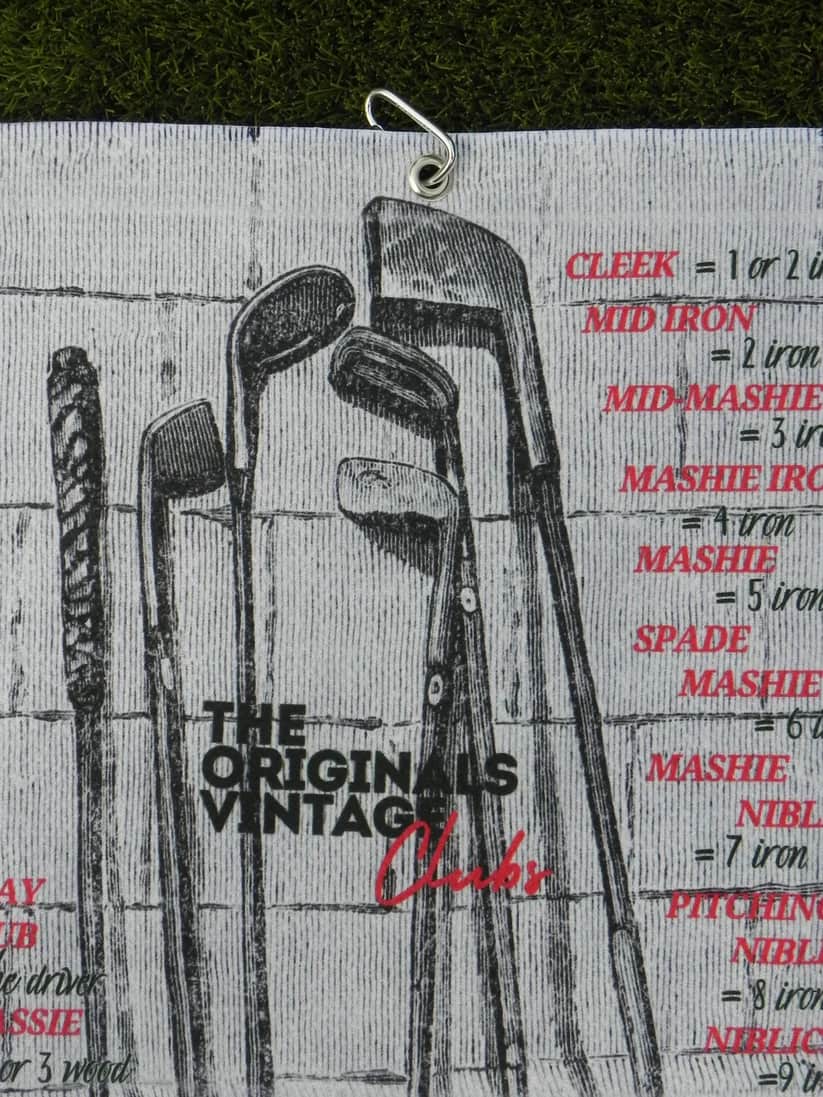 The Originals microfiber golf towel with carabiner, displaying retro-style golf club design and bold typography