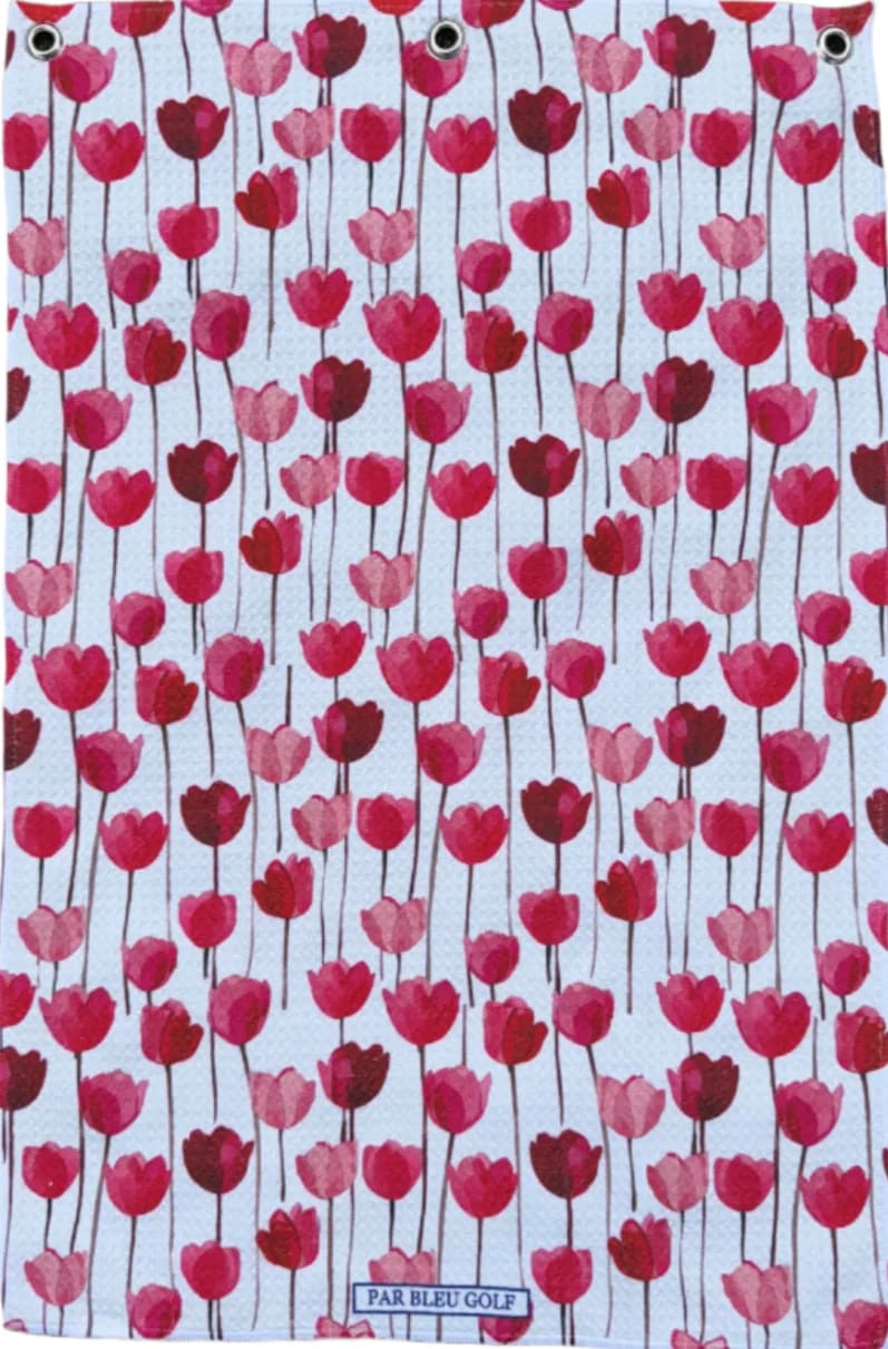 Full view of Red Tulips towel with blooming floral design on white background, soft microfiber towel for golf