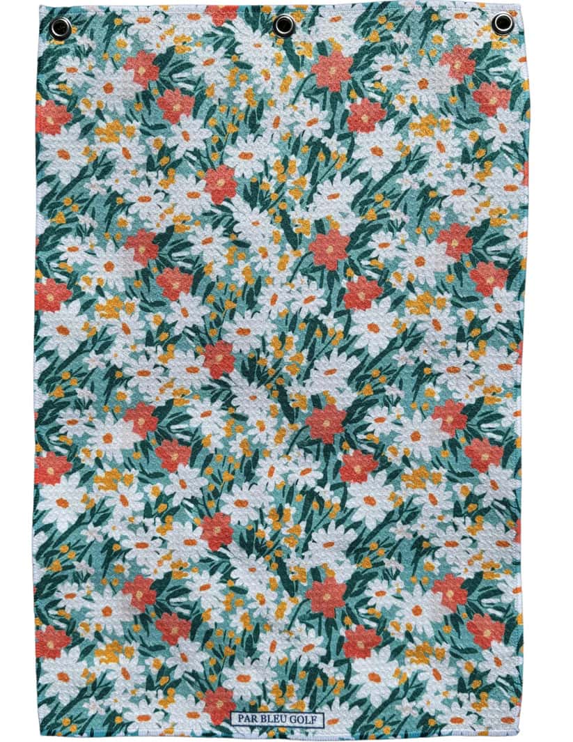 Full view of The Teal & Orange Floral towel featuring daisies and greenery on soft microfiber material