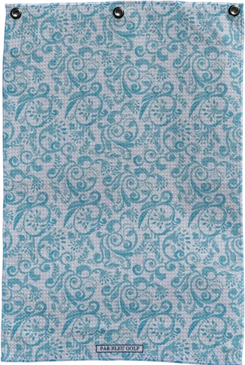 Microfiber golf towel in soft teal Toile pattern shown flat, ideal for stylish on-course cleanup