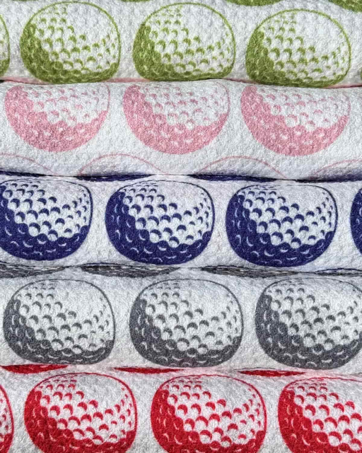 Stacked Par Bleu Golf Towels in Fun Golf Ball Pattern
