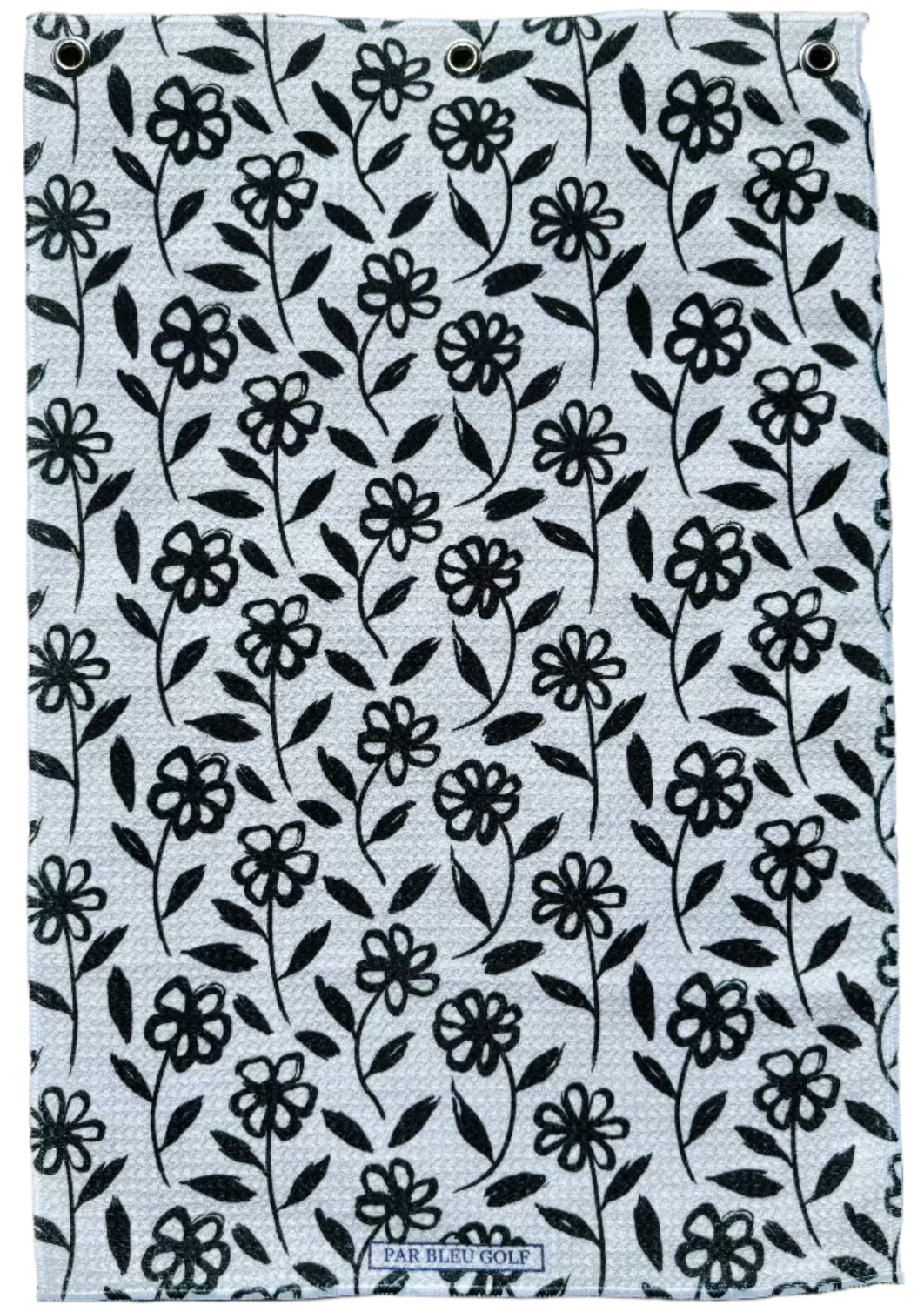 Full front view of The Black Daisy microfiber towel with white background and black daisy pattern