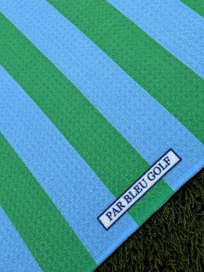 Close-up of The Cabana Stripe: Blue & Green towel with Par Bleu Golf logo and microfiber texture